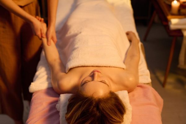 Young Woman Enjoying Deep Massage